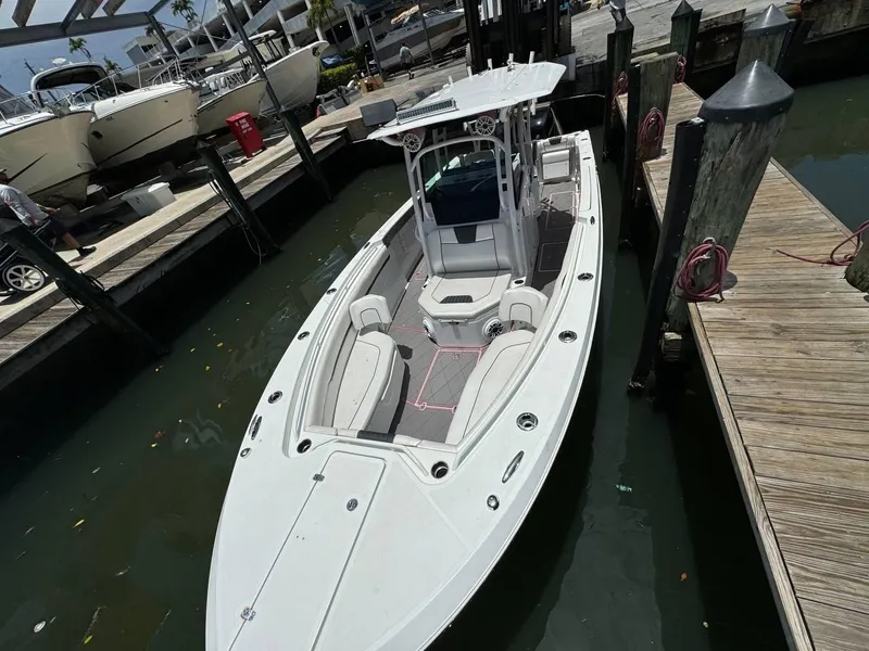 Slide: The Image of 2020 Wellcraft 302 Fisherman boat docked at marina, top view. - 27