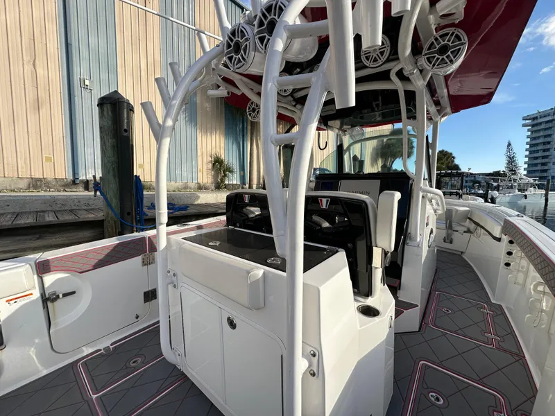 Slide: The Image of 2020 Wellcraft 302 Fisherman boat interior with modern helm and seating. - 9