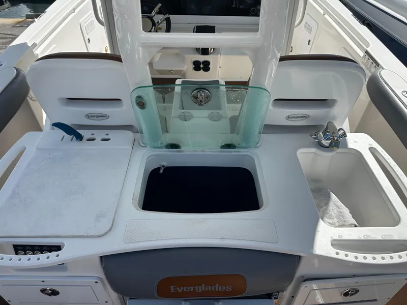 Slide: The Image of 2008 Everglades 350 CC boat interior with fishing station and sink. - 13