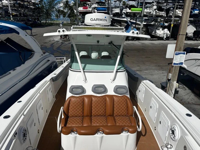 Slide: The Image of 2008 Everglades 350 CC boat with Garmin navigation system at marina. - 22