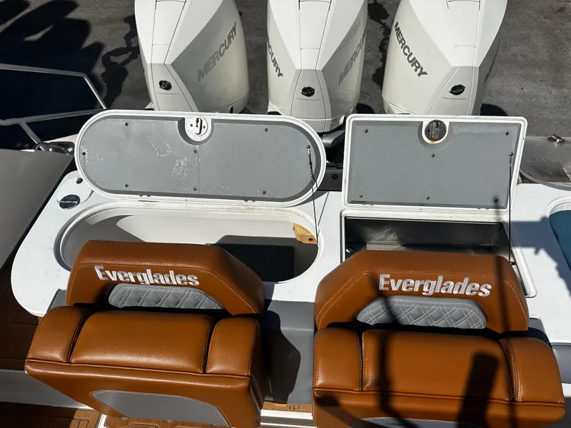 Slide: The Image of 2008 Everglades 350 CC boat with Mercury engines and brown leather seats. - 6