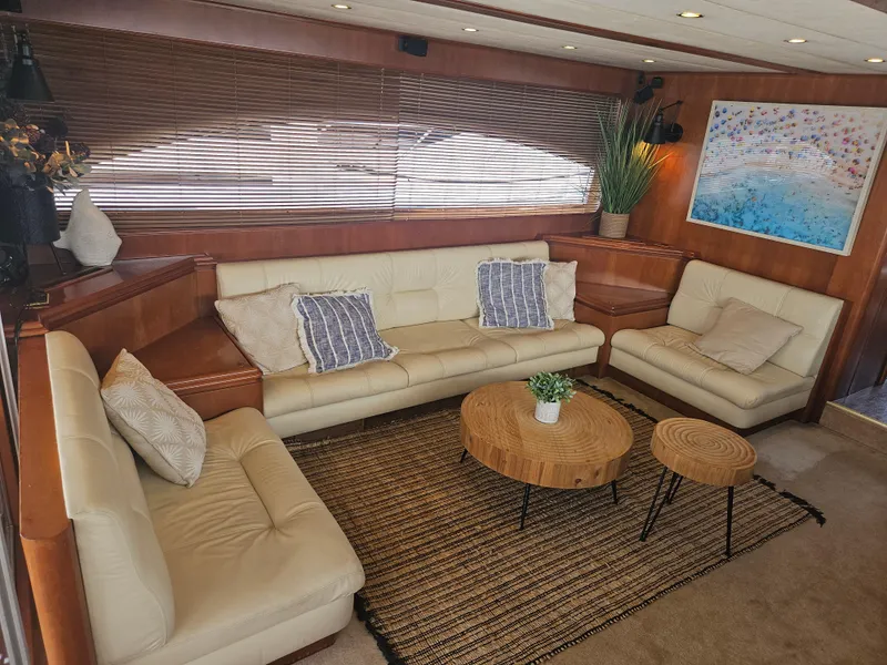 Slide: The Image of Luxurious interior of 1998 Astondoa 72 GLX yacht with cream leather sofas and wooden accents. - 17