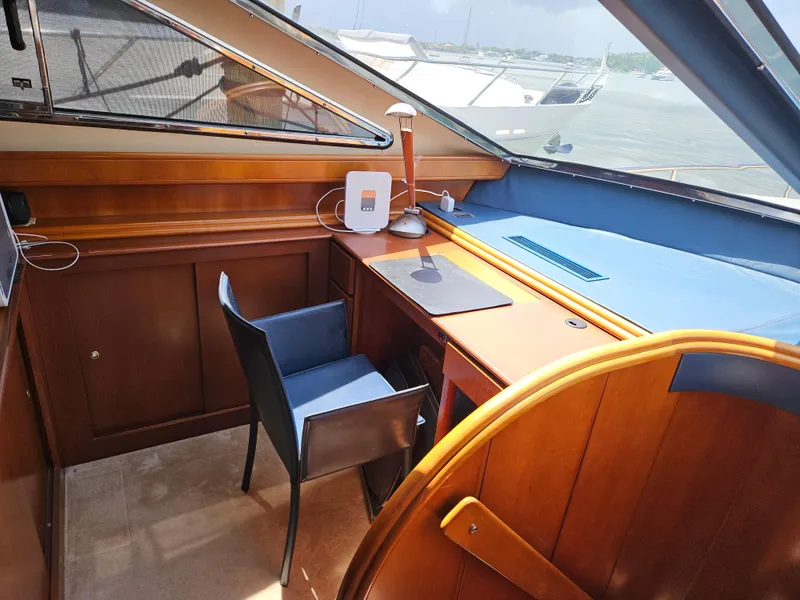 Slide: The Image of Luxurious 1998 Astondoa 72 GLX yacht interior with wooden desk and chair. - 36