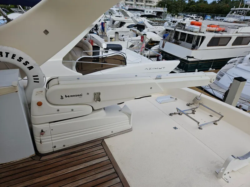 Slide: The Image of Astondoa 72 GLX yacht deck with extended platform, featuring a Besenzoni crane, 1998 model. - 4