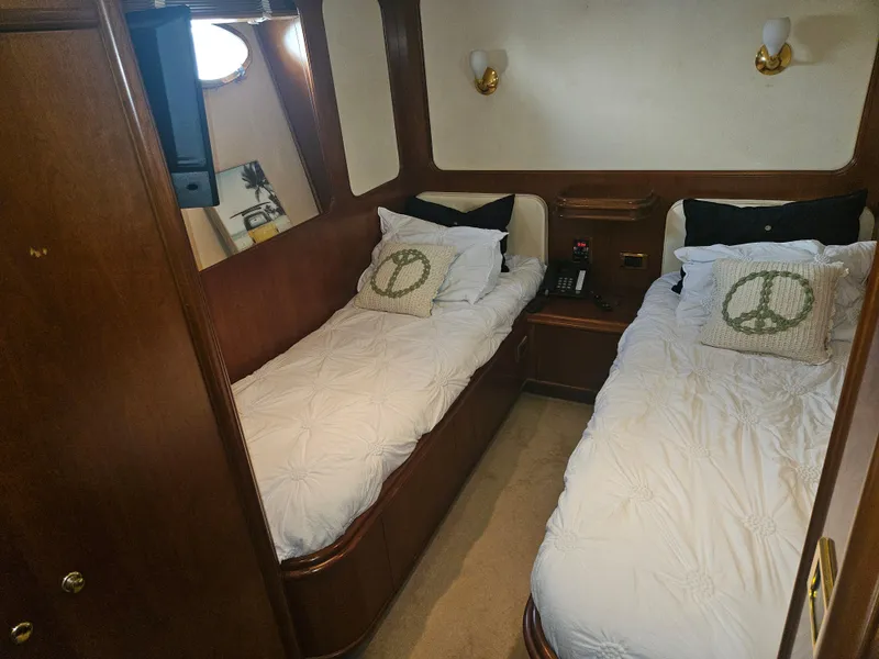 Slide: The Image of Twin cabin with peace-themed pillows on Astondoa 72 GLX yacht, 1998 model. - 44