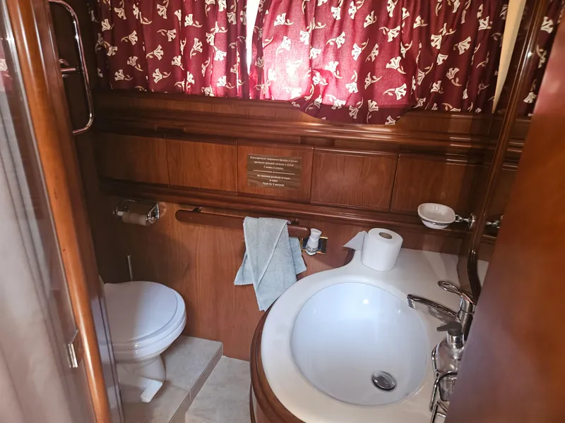 Slide: The Image of Luxurious bathroom in 1998 Astondoa 72 GLX yacht with wood accents and elegant fixtures. - 45