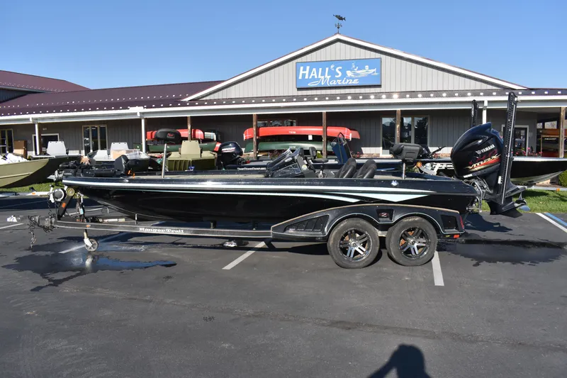 Slide: The Image of 2019 Ranger Z521L boat parked outside Hall's Marine. - 0