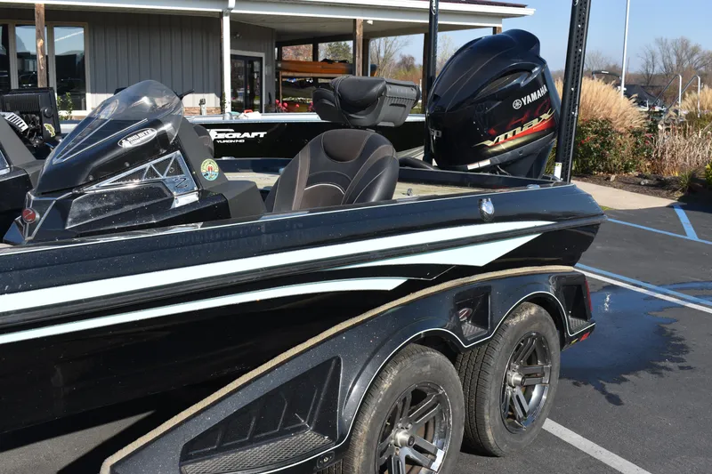 Slide: The Image of 2019 Ranger Z521L boat with Yamaha outboard motor in parking lot. - 1