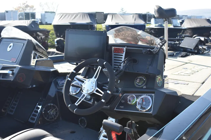 Slide: The Image of 2019 Ranger Z521L boat dashboard with steering wheel and electronic display. - 5