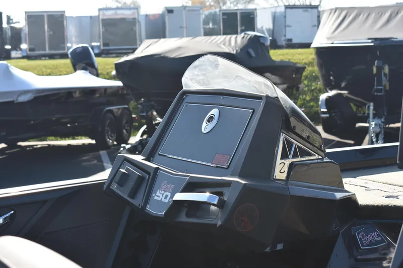 Slide: The Image of 2019 Ranger Z521L boat console and dashboard in a boatyard. - 6