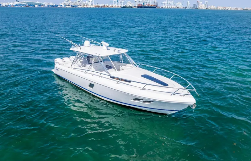 Slide: The Image of 2011 Intrepid 400 Cuddy cruising on open water. - 2