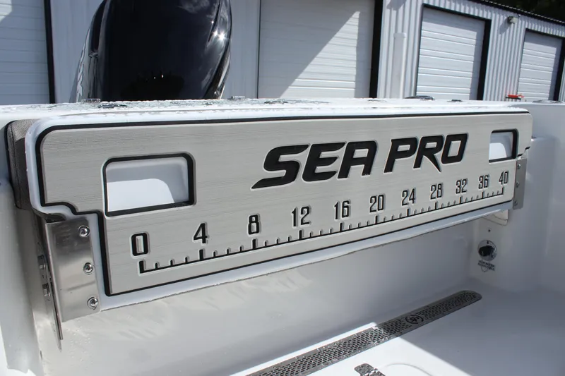 Slide: The Image of 2025 Sea Pro 242 Deep-V boat with integrated measuring ruler. - 14
