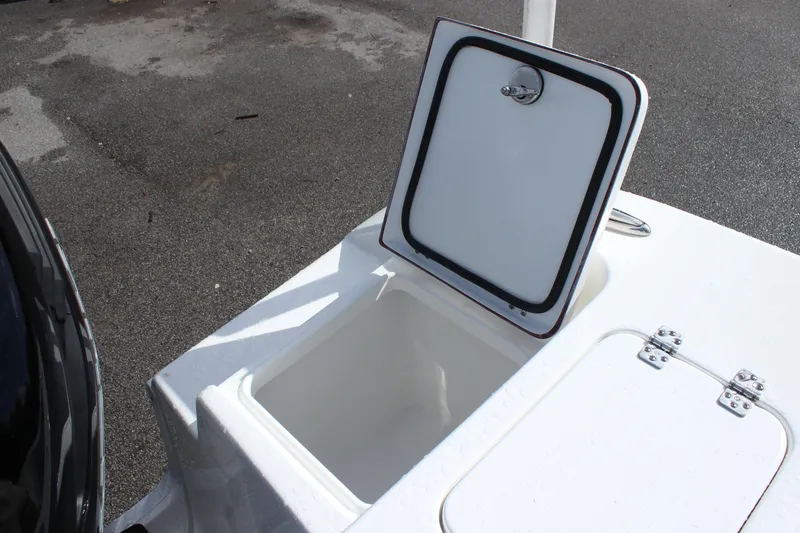 Slide: The Image of Open storage compartment on a 2025 Sea Pro 242 Deep-V boat. - 18