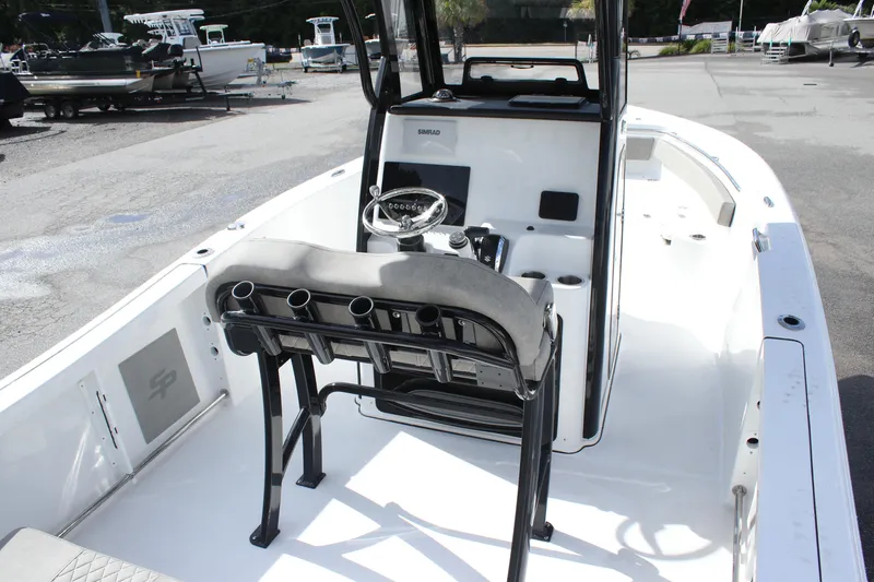 Slide: The Image of 2025 Sea Pro 242 Deep-V boat interior with steering console and seating. - 26