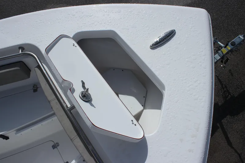 Slide: The Image of 2025 Sea Pro 242 Deep-V boat bow storage compartment. - 8