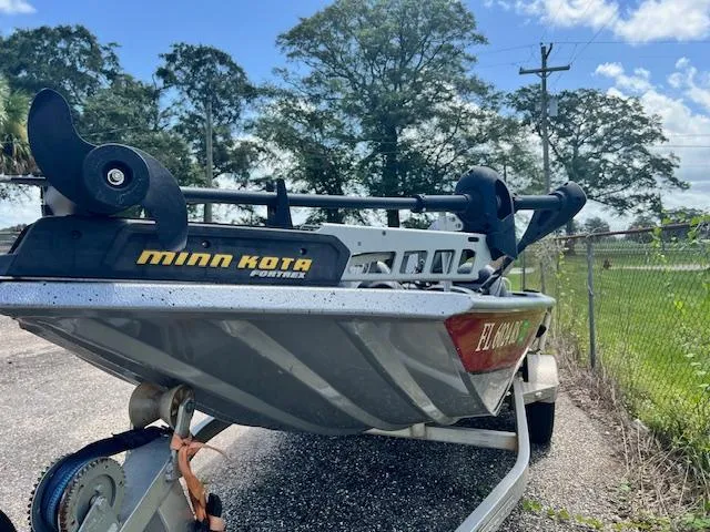 Slide: The Image of 2017 Express XP7 boat with Minn Kota motor on trailer. - 10