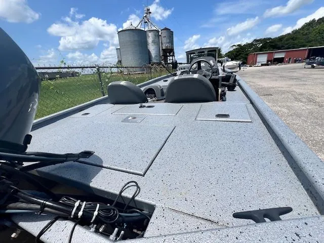 Slide: The Image of 2017 Express XP7 boat with industrial background and clear blue sky. - 5