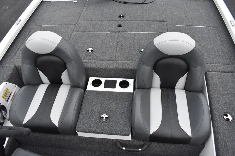 Slide: The Image of 2023 Vexus AVX189C boat interior with dual seats and cup holders. - 12