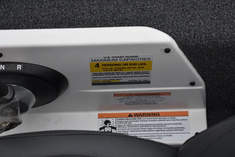 Slide: The Image of 2023 Vexus AVX189C boat capacity and safety warning labels. - 14