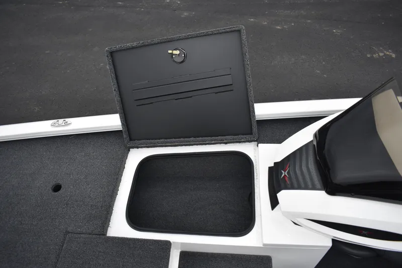 Slide: The Image of 2023 Vexus AVX189C boat storage compartment with open lid. - 9