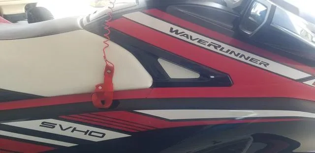 Slide: The Image of 2019 Yamaha WaveRunner GP1800R SVHO, red and white jet ski side view. - 4