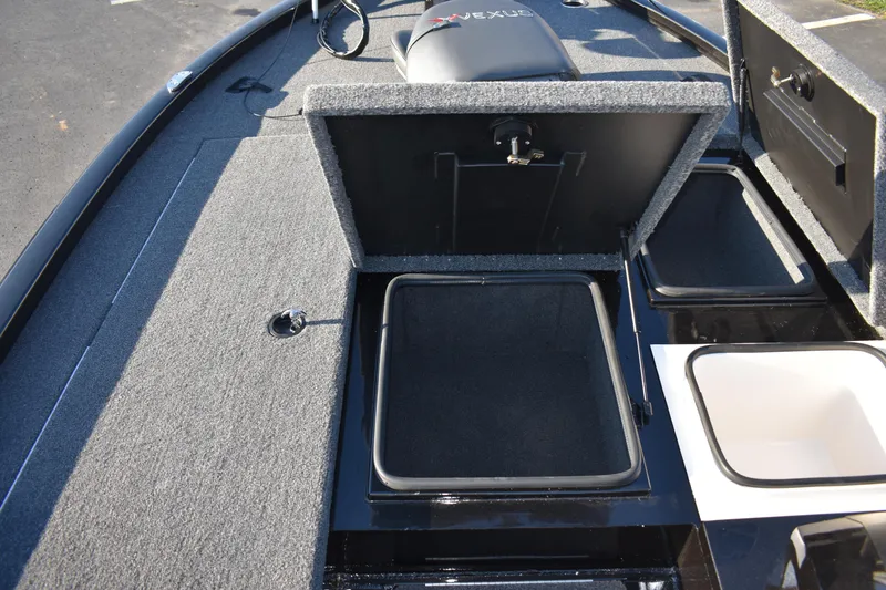 Slide: The Image of 2023 Vexus AVX1980C boat storage compartments and seating area. - 10