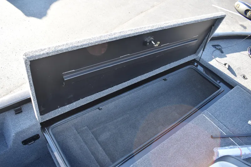 Slide: The Image of 2023 Vexus AVX1980C storage compartment with open lid. - 13