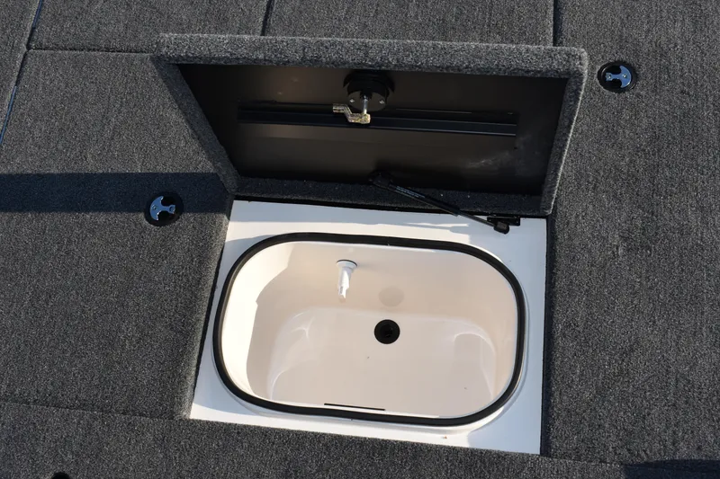 Slide: The Image of 2023 Vexus AVX1980C boat livewell compartment with open lid. - 14
