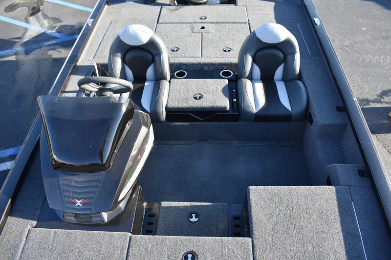 Slide: The Image of 2023 Vexus AVX1980C boat interior with dual seats and steering console. - 5