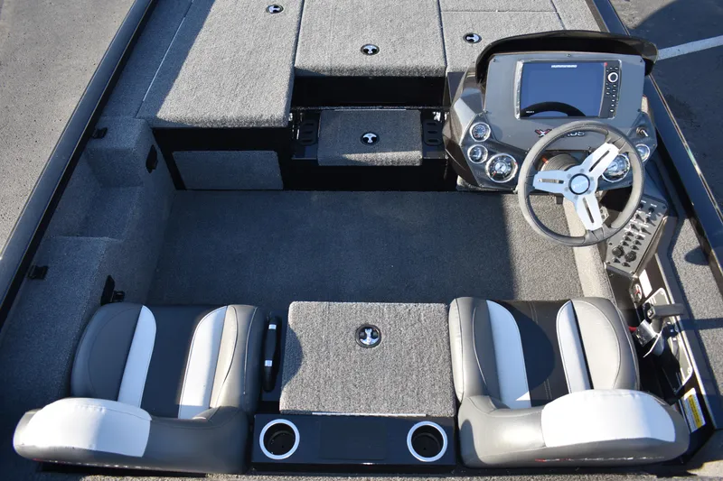 Slide: The Image of 2023 Vexus AVX1980C boat interior with dual seats and modern dashboard. - 8