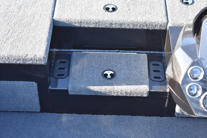 Slide: The Image of 2023 Vexus AVX1980C boat deck with storage compartments and control panel. - 9