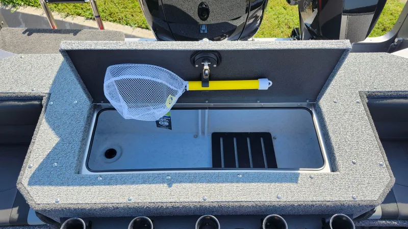 Slide: The Image of 2025 Lund 1875 Fisherman boat livewell with net and storage compartment. - 16