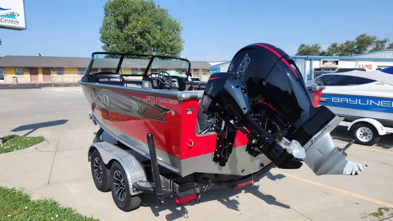 Slide: The Image of 2025 Lund 1875 Fisherman boat with outboard motor on trailer. - 4