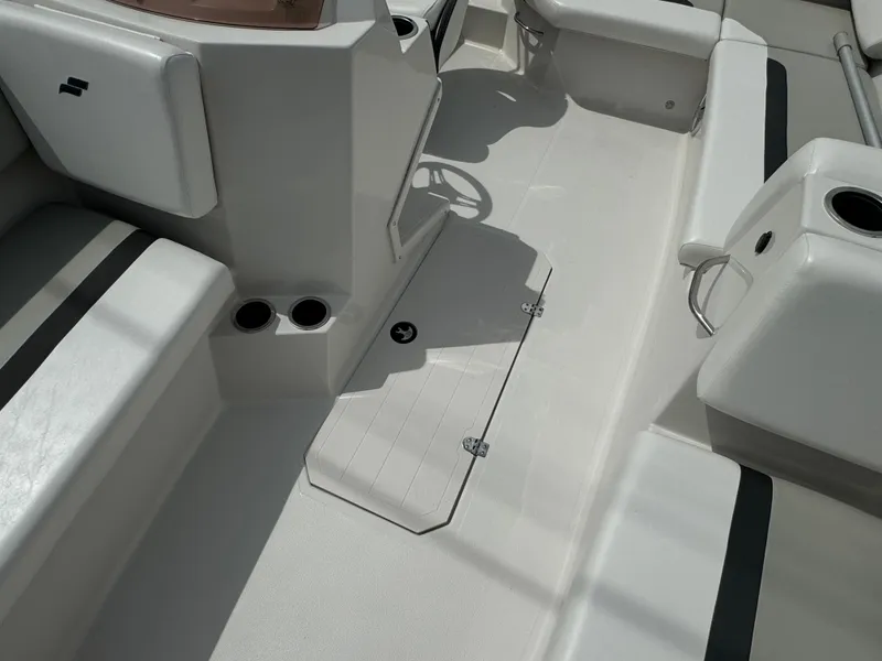 Slide: The Image of 2023 Starcraft SVX 171 OB boat interior with seating and storage compartments. - 18