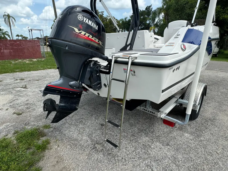 Slide: The Image of 2023 Starcraft SVX 171 OB boat with Yamaha outboard motor on trailer. - 25