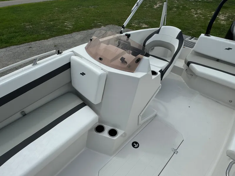 Slide: The Image of 2023 Starcraft SVX 171 OB boat interior with seating and console. - 9
