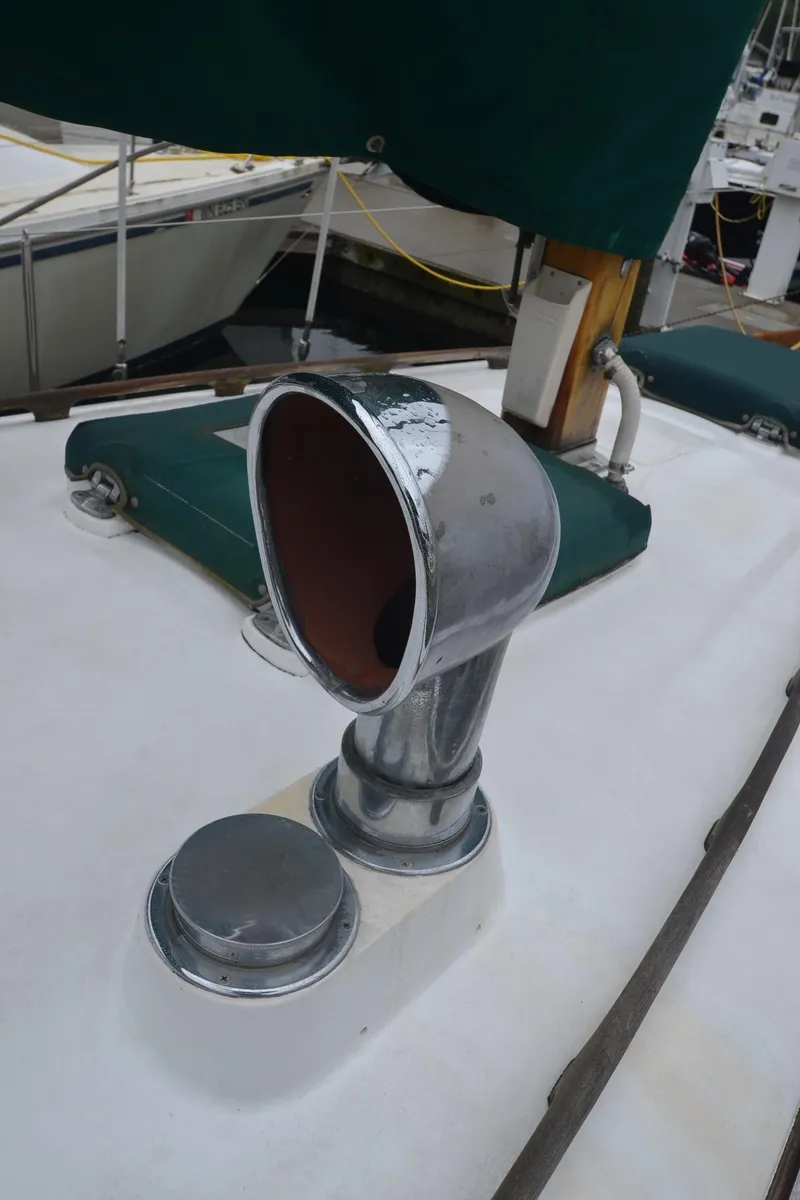 Slide: The Image of Chrome vent on 1978 Cheoy Lee Offshore 32 yacht deck. - 11