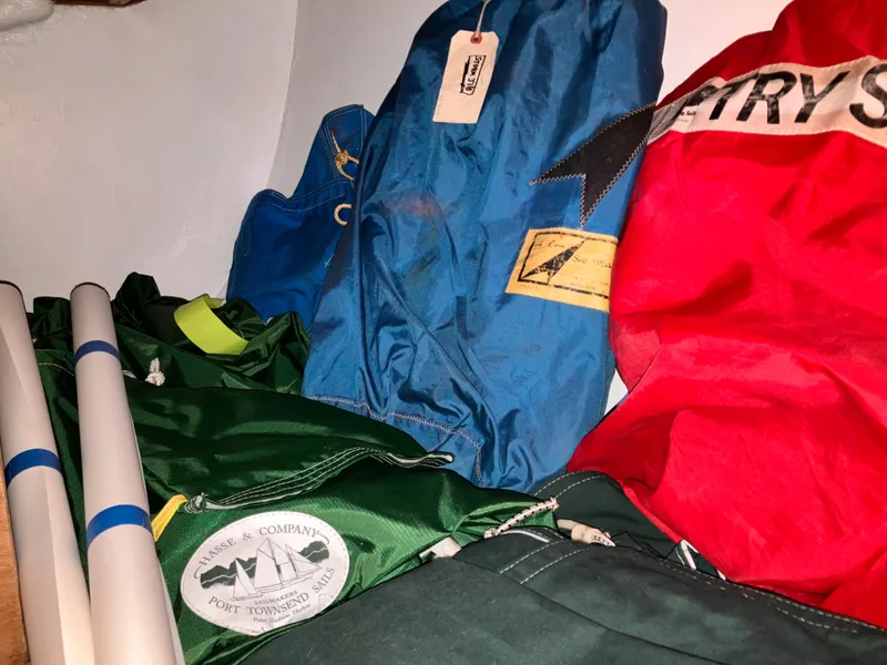 Slide: The Image of Sailing gear and bags inside a 1978 Cheoy Lee Offshore 32 yacht. - 38