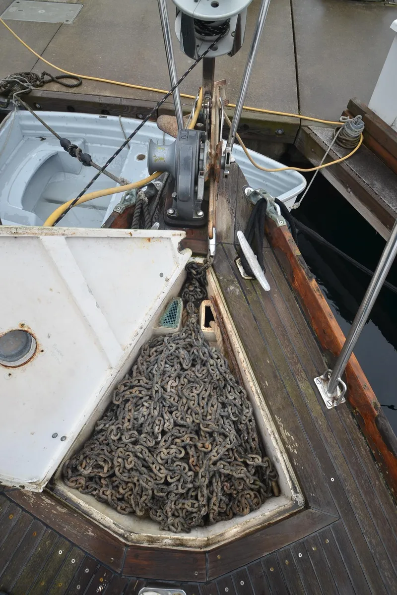 Slide: The Image of 1978 Cheoy Lee Offshore 32 sailboat anchor chain storage on deck. - 39