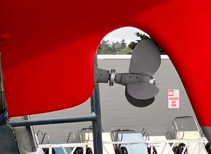 Slide: The Image of Propeller of 1978 Cheoy Lee Offshore 32 sailboat, red hull, docked. - 45