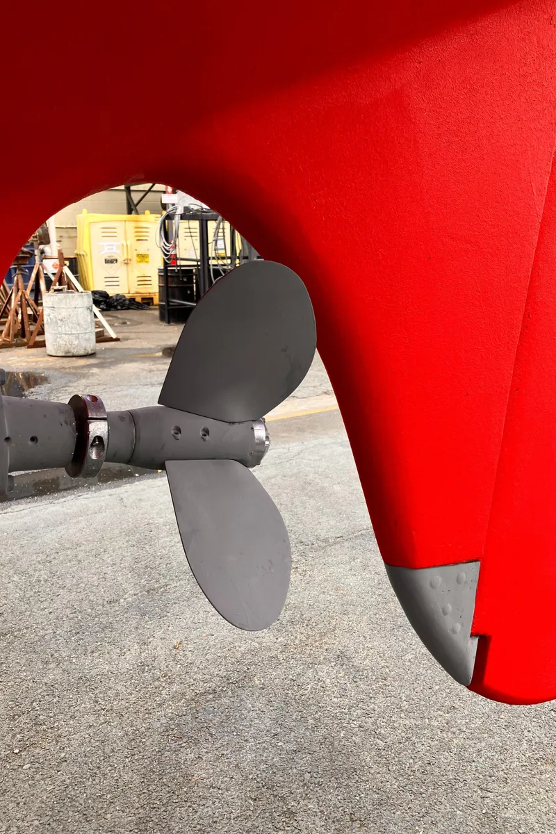 Slide: The Image of Close-up of 1978 Cheoy Lee Offshore 32 sailboat propeller and rudder. - 46