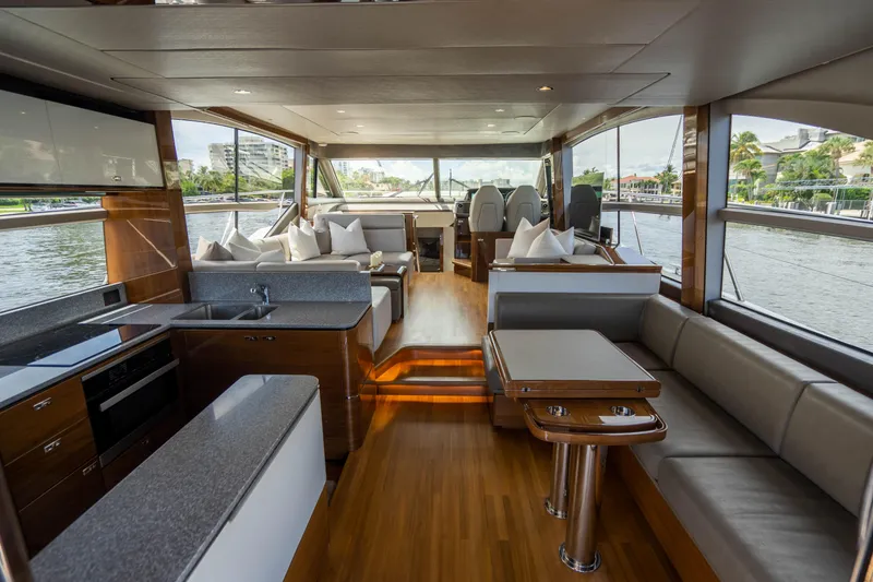 Slide: The Image of Luxurious interior of 2018 Princess F62 yacht with modern kitchen and seating area. - 21
