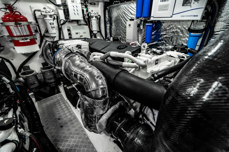 Slide: The Image of Engine room of a 2018 Princess F62 yacht with advanced machinery and equipment. - 28