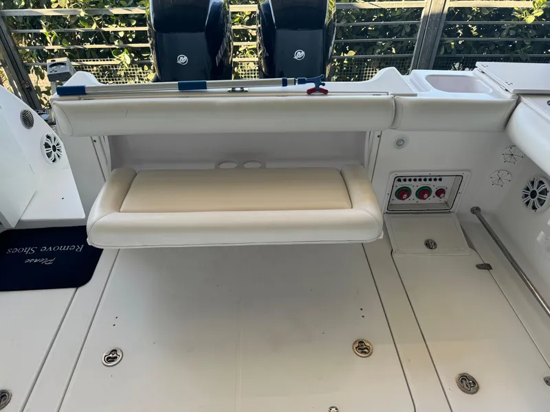 Slide: The Image of 2006 Pro-Line 32 Express boat interior with seating and control panel. - 10