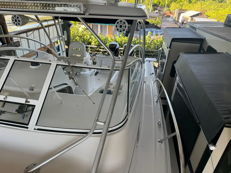 Slide: The Image of 2006 Pro-Line 32 Express boat with sleek design and modern features. - 25