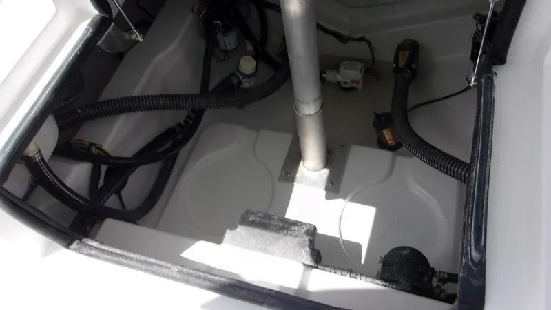 Slide: The Image of 2025 Sportsman Heritage 231 CC boat interior wiring and components. - 12