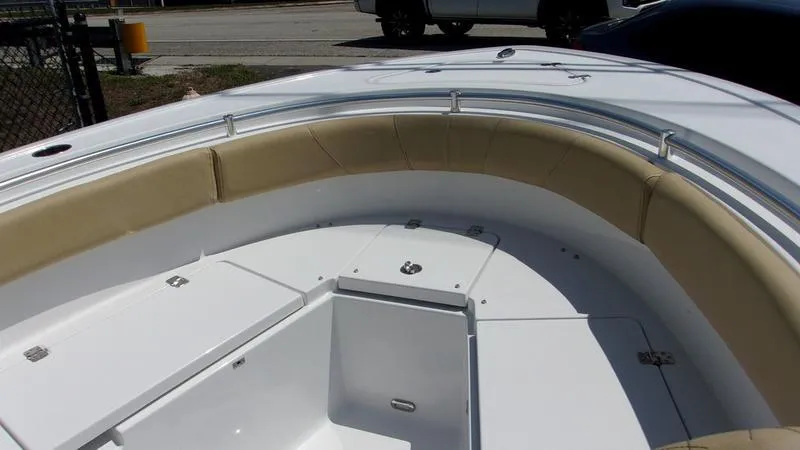 Slide: The Image of 2025 Sportsman Heritage 231 CC boat with spacious seating and storage. - 13