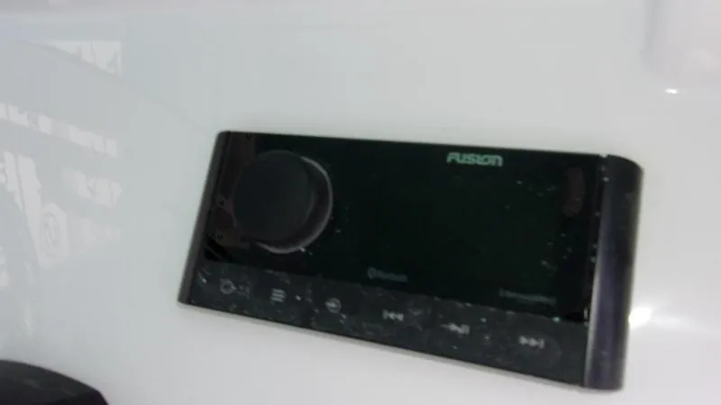 Slide: The Image of Fusion audio system on 2025 Sportsman Heritage 231 CC boat dashboard. - 14