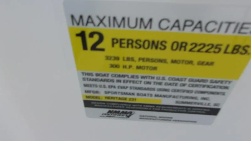Slide: The Image of Capacity label for 2025 Sportsman Heritage 231 CC boat, 12 persons or 2225 lbs. - 19