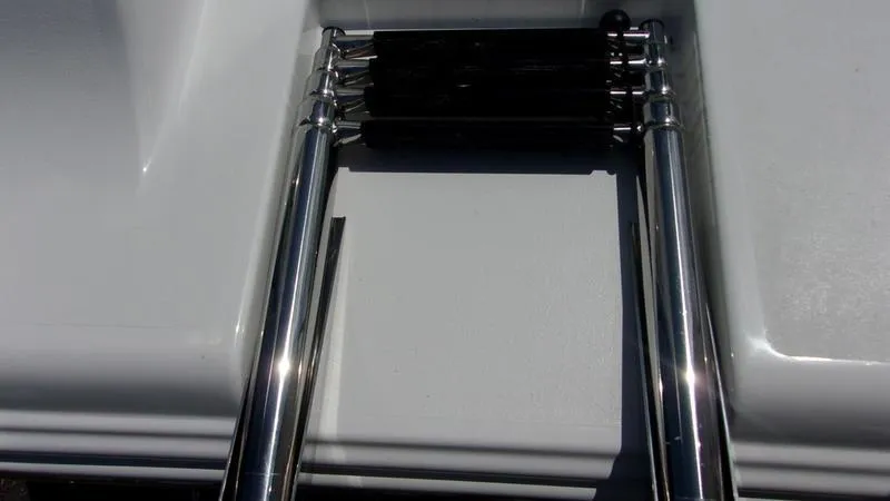 Slide: The Image of Stainless steel ladder on 2025 Sportsman Heritage 231 CC boat. - 8